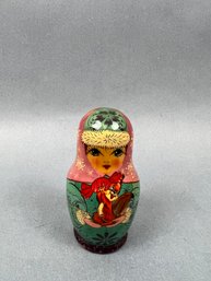 3 Miniature Nesting Dolls.