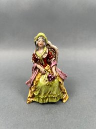 Vintage German Porcelain Figurine Of A Lady.