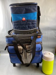 2 Coolers And A Water Jug