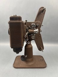 Vintage Revere 8mm Projector With Case And A Movie.