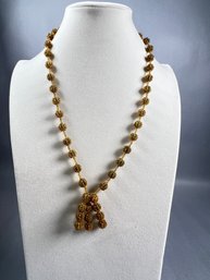 Gold Bead Necklace With Tassel