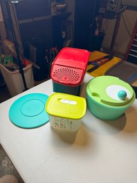 Four Pieces Of Tupperware