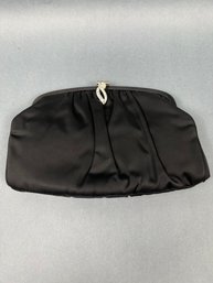Black Clutch With Crystal Filigree Closure Bow On Back And Attached Coin Purse.