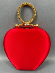 Red Heart Bag With Gold Handle.