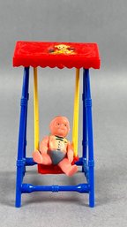 Plastic Toy Swing With Plastic Baby