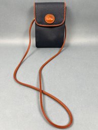 Dooney And Burke Navy And Leather Travel Purse.