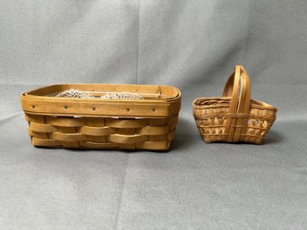 2 Baskets Large One Is Longaberger.