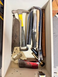 Drawer Full Of Hammers And Prying Tools