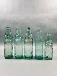 4 -  Antique Aqua Glass Codd-Neck Bottles With Internal Glass Marble Stoppers, Plus One Regular