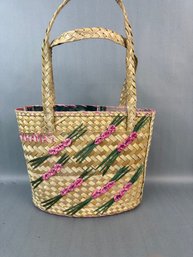 Straw Bag With Pink Accents And Handles