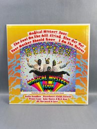 The Beatles' Magical Mystery Tour Album, Likely A Vinyl Pressing That Includes A 24-page Full-color