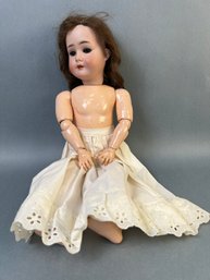 18 Inch Schoenau And Hoffmeister Porcelain Head Doll.