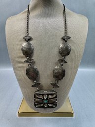 Estee Lauder Solid Perfume Pendant On A Silver Tone Necklace