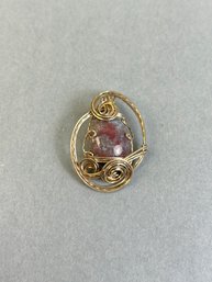 Abstract Twisted Wire Pendant With Purple And Blue Stone