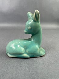 Turquoise Deer Laying Down