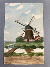 Vintage Postcard Watercolor Painting Of A Traditional Dutch Windmill Beside A Canal