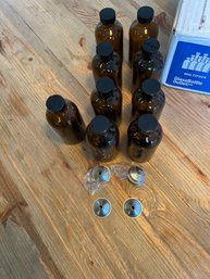 9 Brown Bottles With Funnels