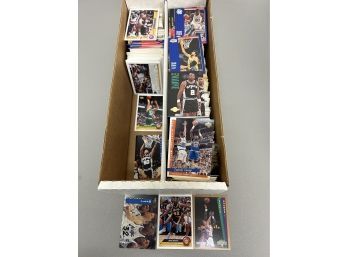 Box Of Mostly Basketball Cards From The Early 90s With Some Football And Baseball Cards Mixed In.