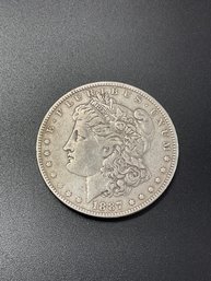 1887 O Morgan Silver Dollar