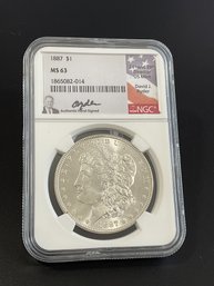 1887 NGC MS63 Morgan Silver Dollar