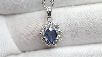 NATURAL SAPPHIRE PENDANT SET IN SOLID PT900 PLATINUM WITH DIAMOND HALO 1.12CTW, 4.9 GRAMS, DIAMONDS
