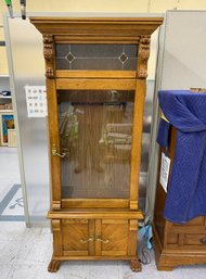 Lighted Gun Cabinet With  Lions Head Carving