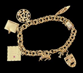 14 Karat Gold Bracelet With Charms 33.1 Grams