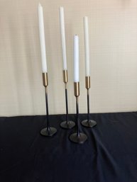 Four Black Metal & Brass Sticks