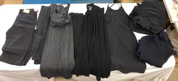 Assortment Of Dark Tone Professional Clothing