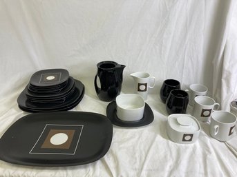 Set Of Matching Plates And Mugs