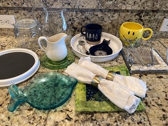 Assortment Of Different Dishes And Pitchers