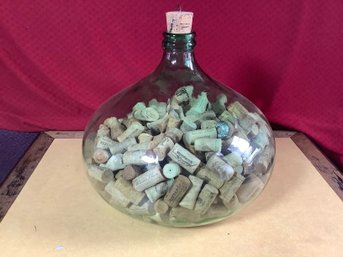 Old Wine Jug Filled With Wine Bottle Corks