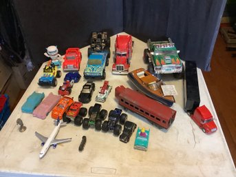 Assorted Trucks, Cars And More