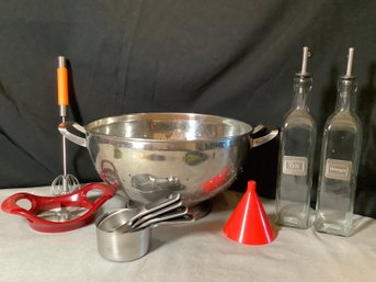 Kitchen Ware W/ Collander, Oil & Vineger Jars, Stainless Mearuing Cups & More