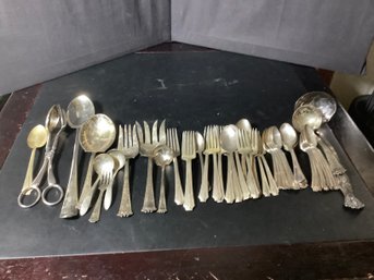 Assorted Silver Plate Flatware And Serving