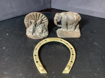 Cast Iron Book Ends And Brass Horse Shoe