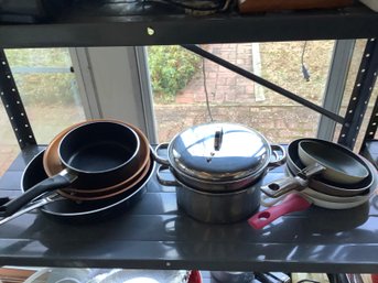 Shelf Of Frying Pans And Stock Pot