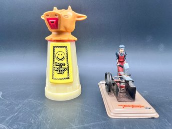 Vintage Working Toy Blacksmith By Fleischmann From West Germany And A Cow Sippy Cup By Whirley Industries