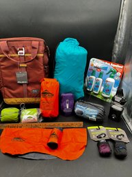 Lot Of Camping Supplies Including  Bug Repellent Inflatable Pillows, Pads A Cooler Pack Light And Chair