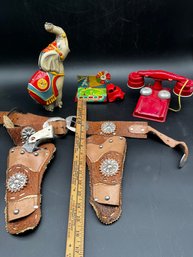 Lot Of Vintage Tin Toys Needing Repair And A Six Shooter Cap