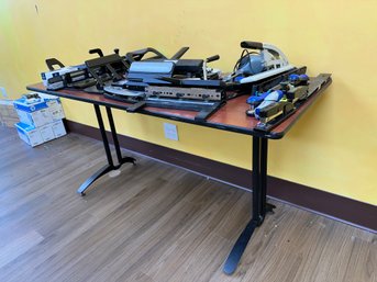 Table And Collection Of Staplers Hole Punches And More