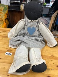 Stuffed Doll With Heart Necklace