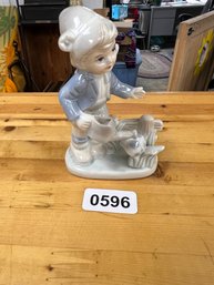 Vintage Figurine  Boy Watering Flowers