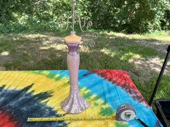 Jewelry Display Purple Dressed Woman