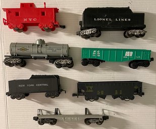 7 LIONEL Postwar Train Cars & Freight Cars As Shown