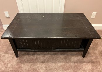 Coffee Table With Sliding Side Doors For Hidden Storage