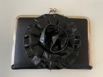 Vintage Black Clutch Purse Featuring A Large, Three-dimensional Decorative Flower On The Front
