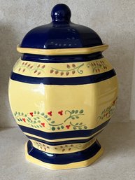 A Hand-painted Yellow And Blue Ceramic Cookie Jar With Floral Motifs