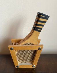 Fun Tennis Coasters Held In Racket Press