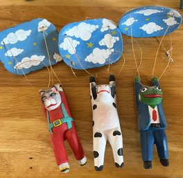 Hand-carved And Painted Wooden Animal Figures With Cloud Ornaments